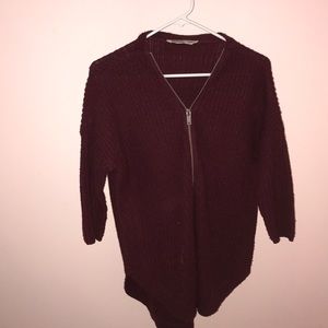 1/4 sleeve maroon sweater with a 1/2 zip front